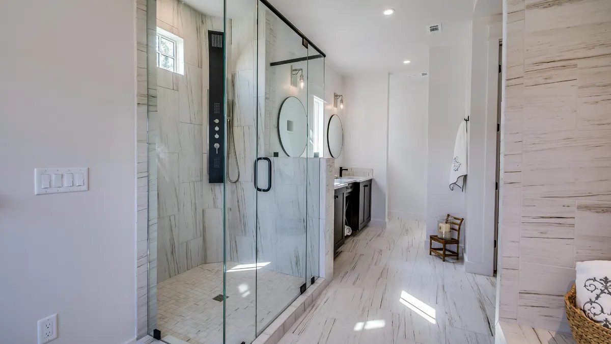 Shower & Bathtub Repair — professional plumber at work
