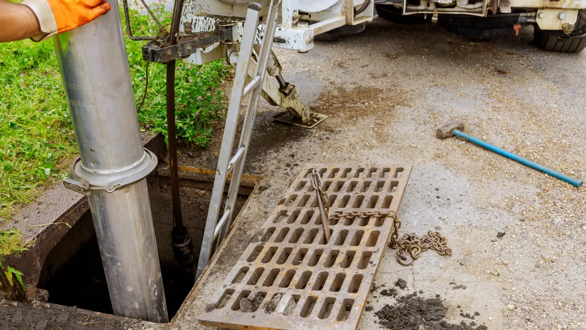 Main Line Cleaning — professional plumber at work